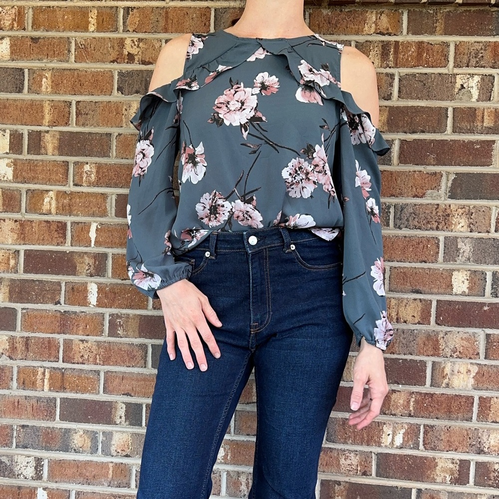Cute peekaboo shoulder blouse.